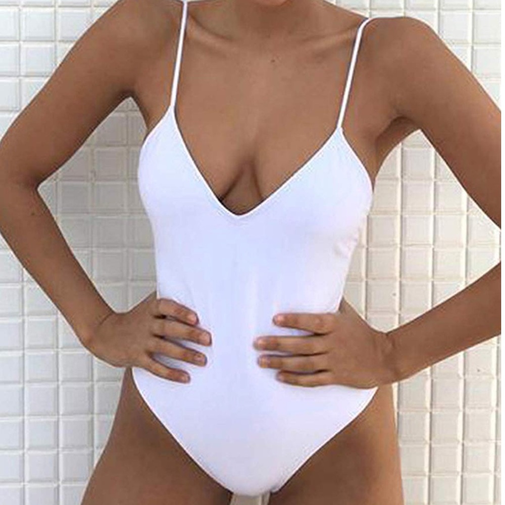 White cinched one piece swimsuit